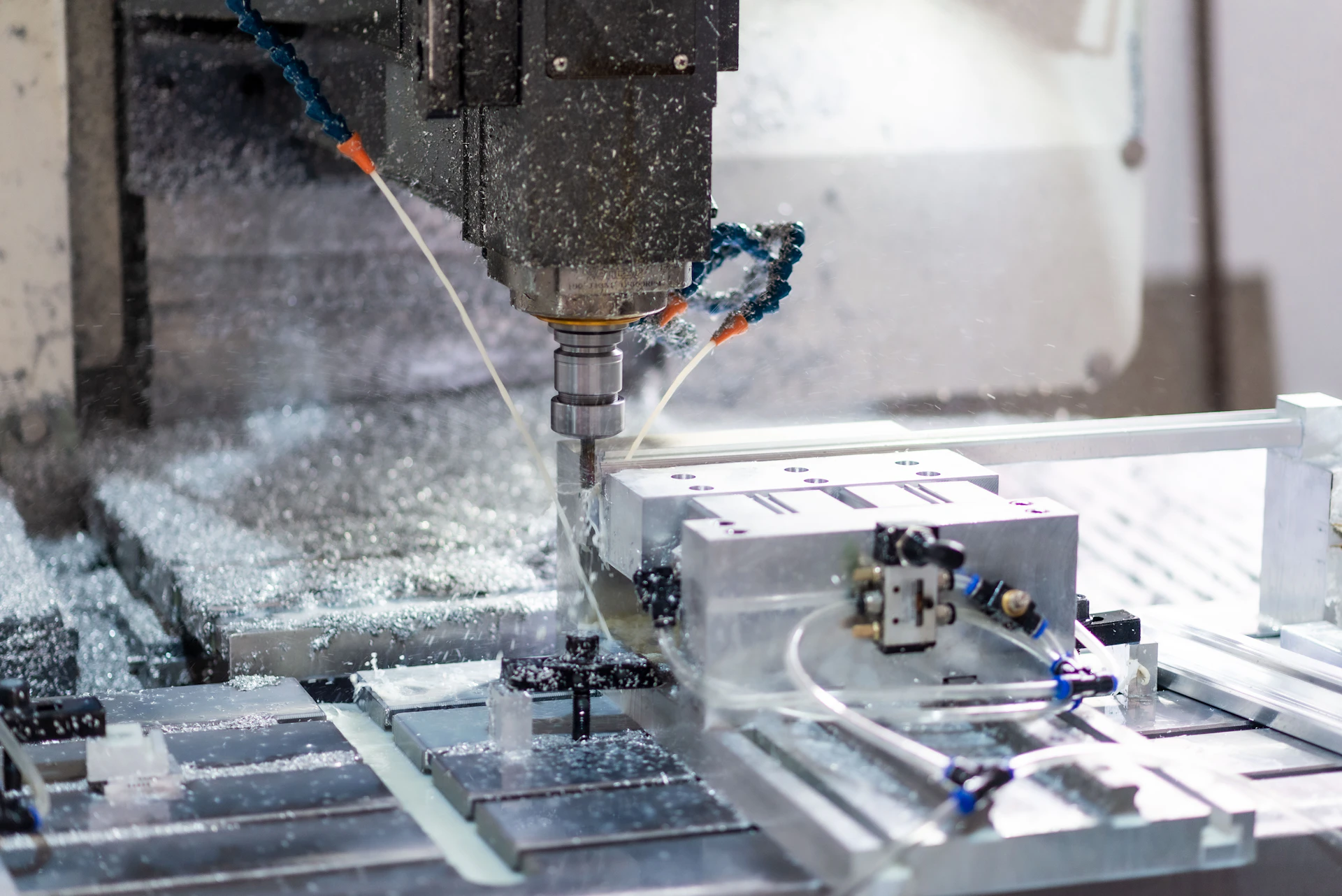 A CNC milling machine machining an aluminum component